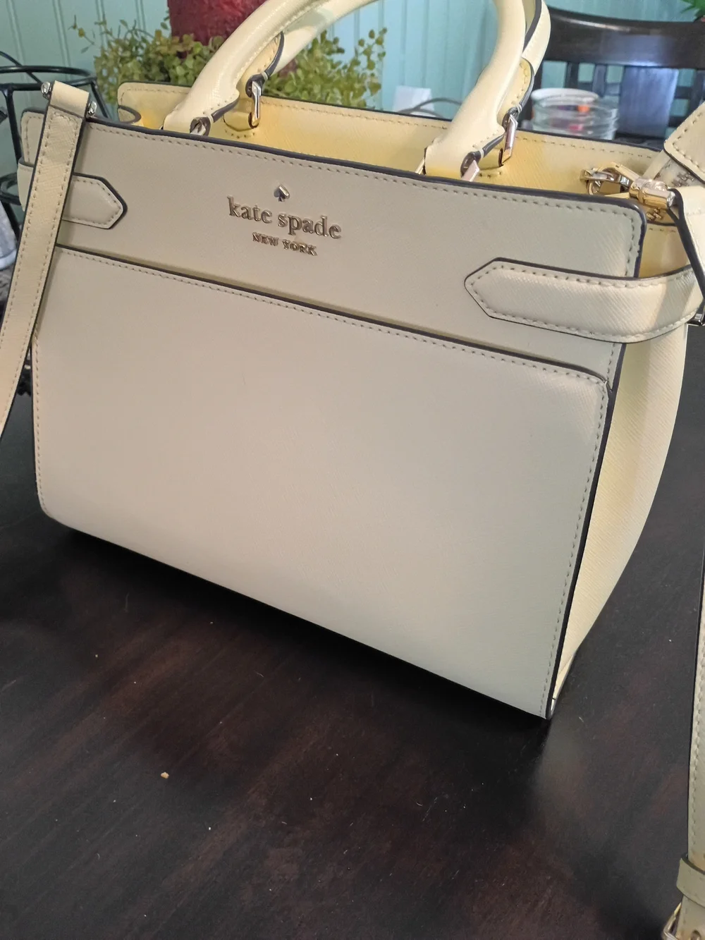Kate Spade Staci Medium Satchel in a light yellow colorway.